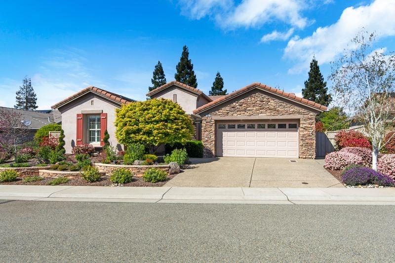 1867 Hawk Hill Lane Lincoln, CA 95648 - Photo 1 of 1 a front view of a house with a yard and garage