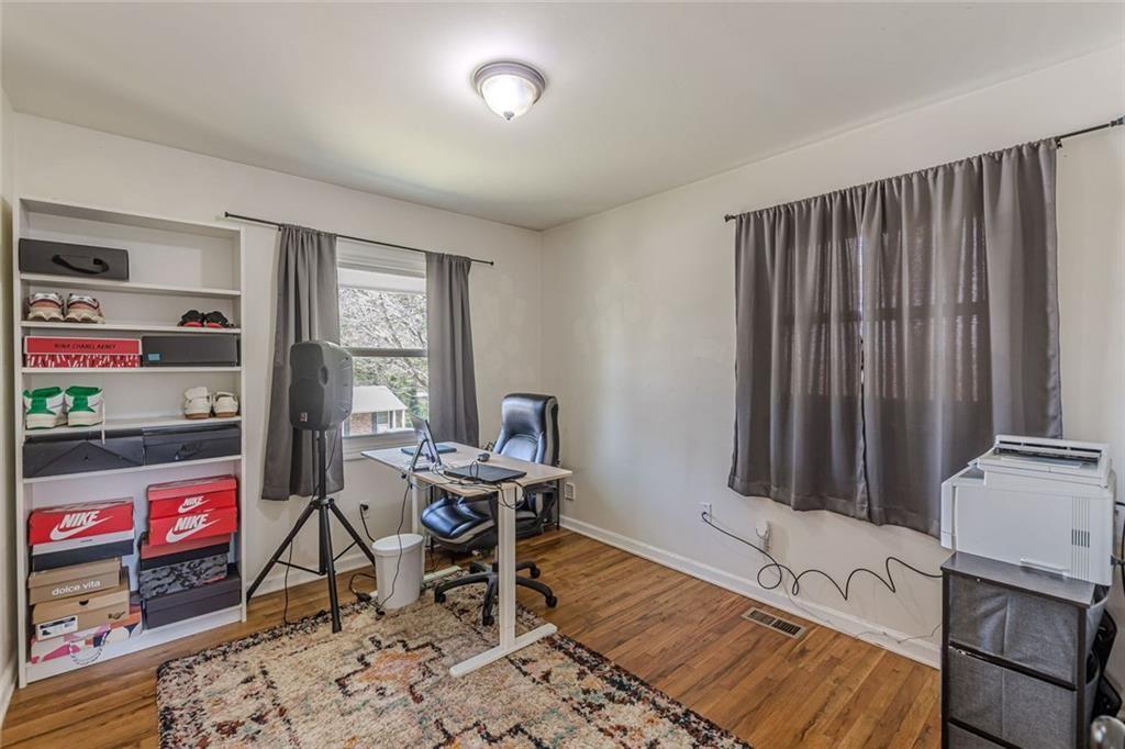 4558 Ryan Road Conley, GA 30288 - Photo 25 of 34 a workspace with furniture and window