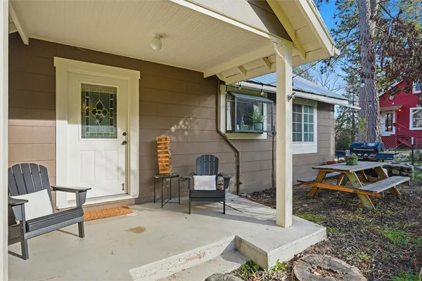 a backyard of a house with seating space