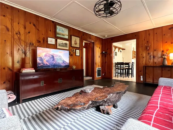a living room with a couch and a flat screen tv