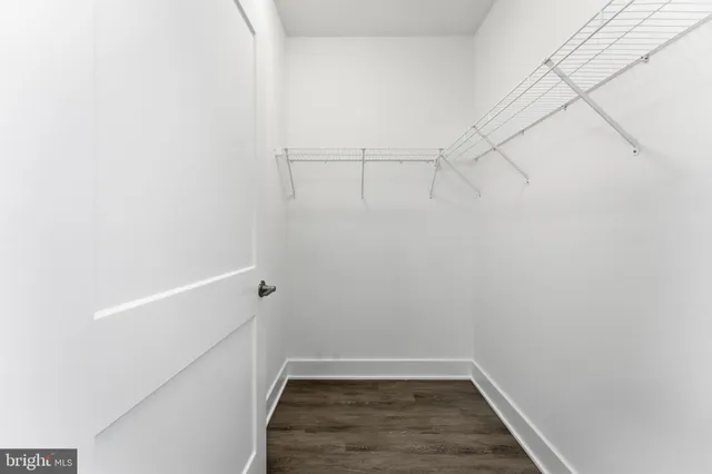 a view of an empty walk in closet