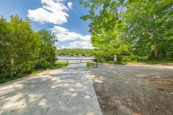 a view of a lake with a house