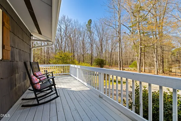 a view of balcony with furniture