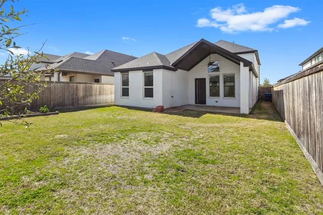 a front view of house with yard