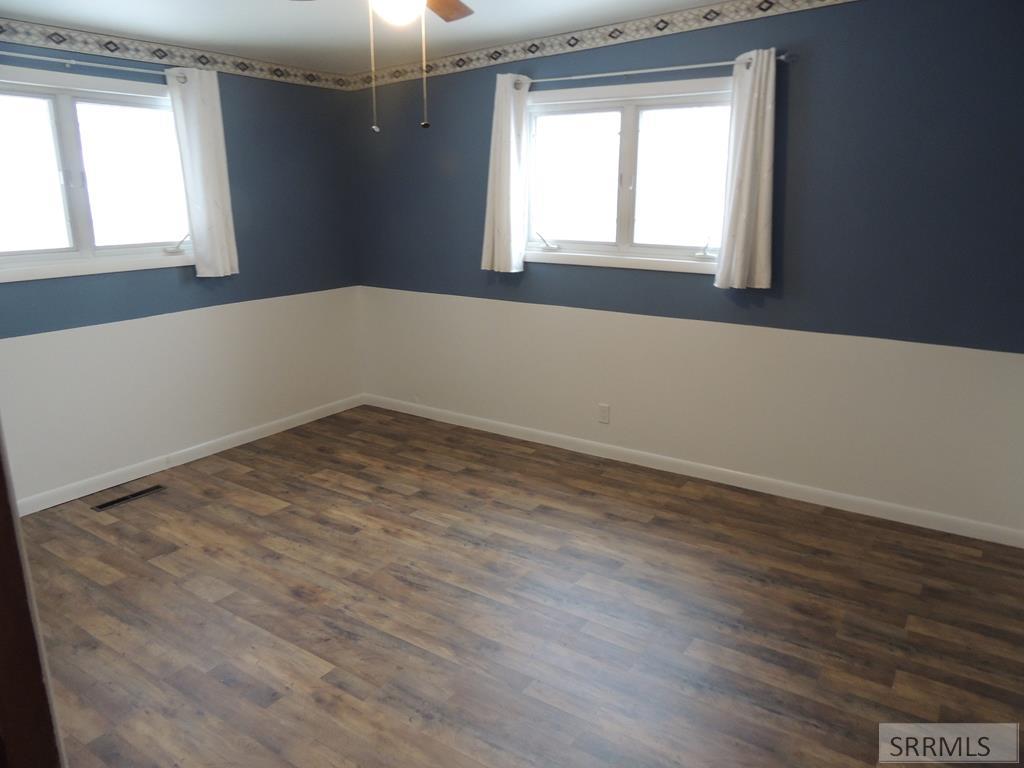 235 West 6th South St. Anthony, ID 83445 - Photo 7 of 18 Large bedroom #2 w new LVP