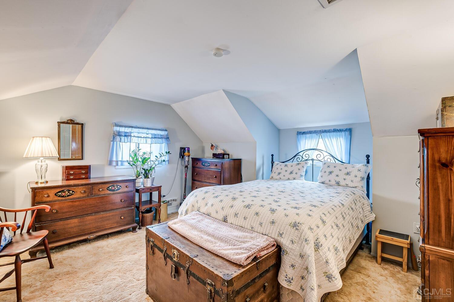 190 McFarlane Road Colonia, NJ 07067 - Photo 21 of 32 a bedroom with a bed and furniture