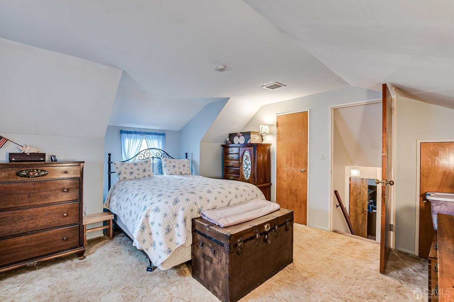 190 McFarlane Road Colonia, NJ 07067 - Photo 22 of 32 a bed room with a bed and a tv