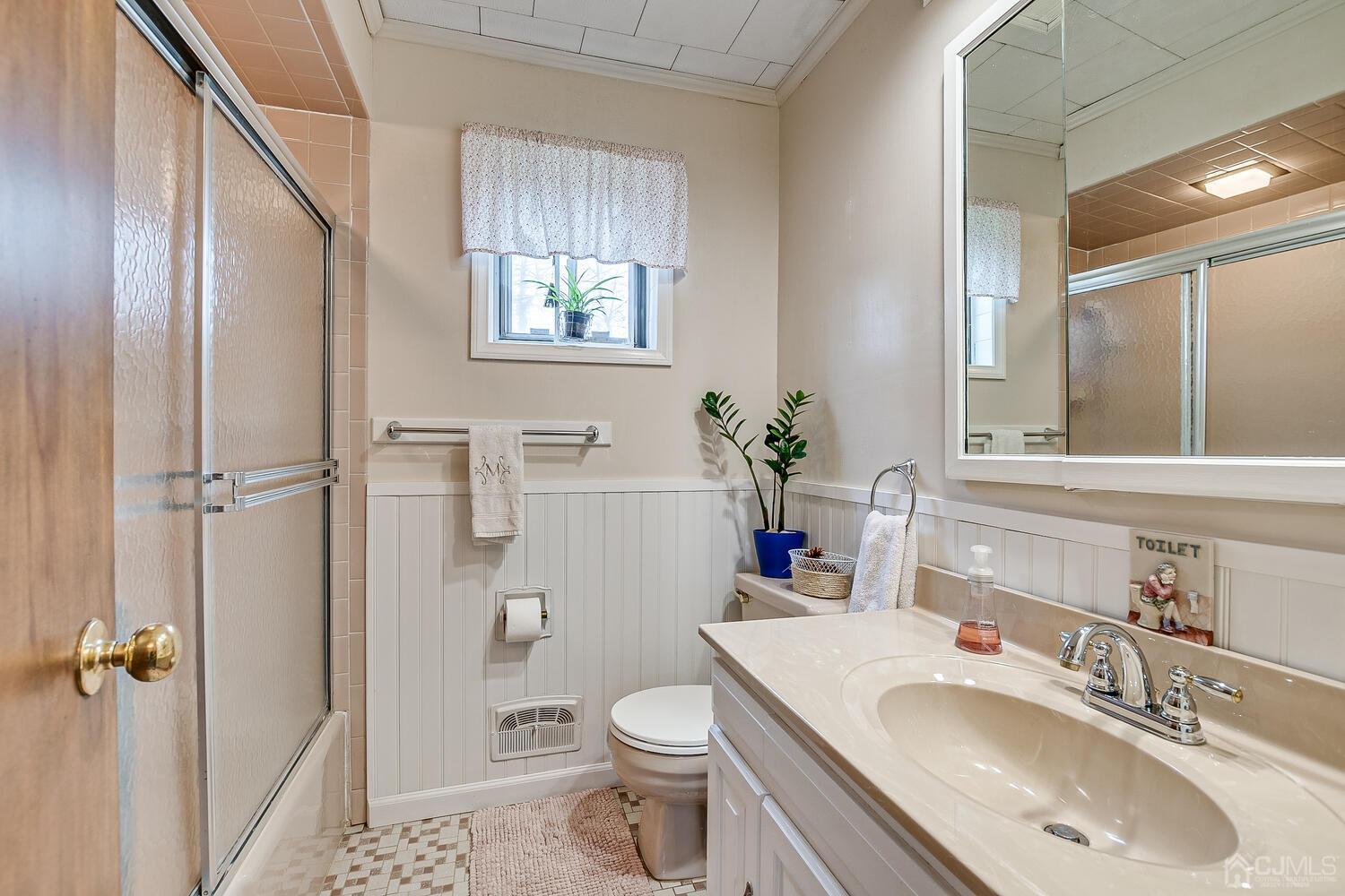 190 McFarlane Road Colonia, NJ 07067 - Photo 23 of 32 a bathroom with a sink toilet and shower