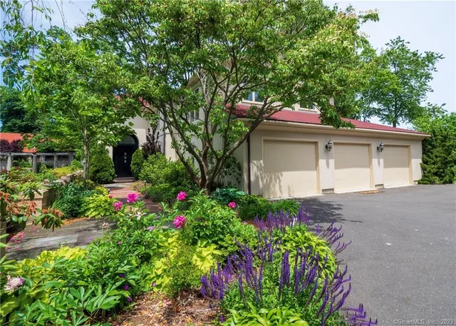 a house view with a garden space