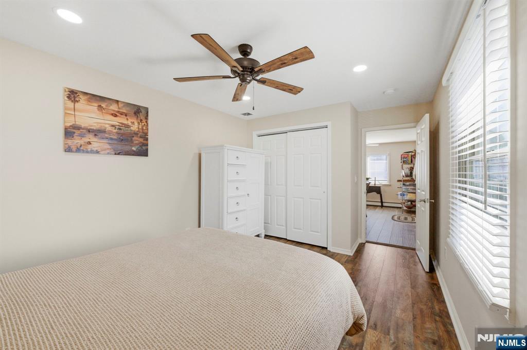 24 Maple Avenue Waldwick, NJ 07463 - Photo 12 of 45 a bedroom with a bed and a large window