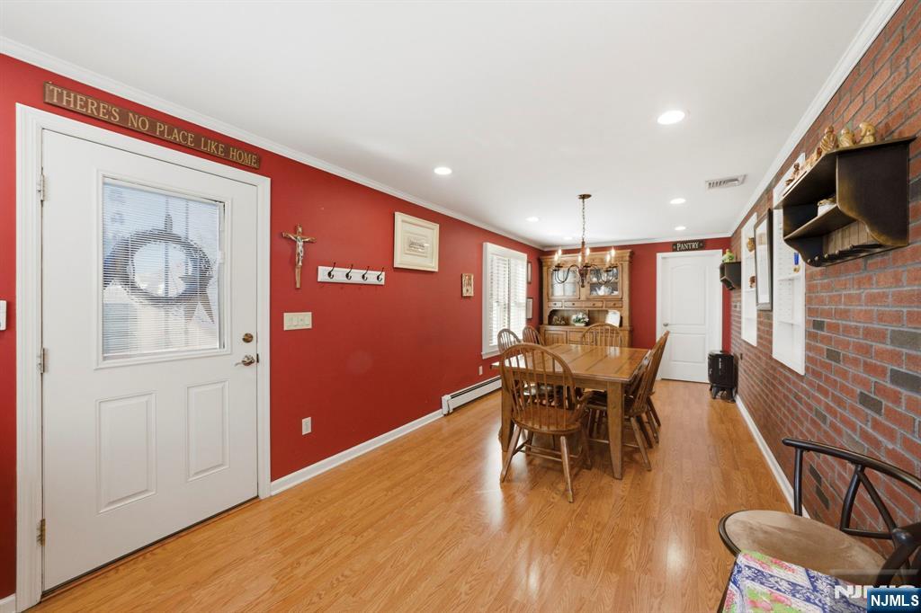 24 Maple Avenue Waldwick, NJ 07463 - Photo 24 of 45 a dining room with furniture and wooden floor