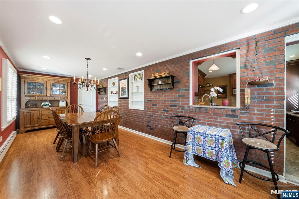 24 Maple Avenue Waldwick, NJ 07463 - Photo 25 of 45 a dining room with furniture and wooden floor