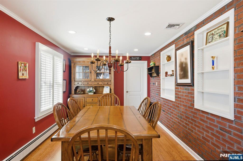 24 Maple Avenue Waldwick, NJ 07463 - Photo 26 of 45 a view of a dining room with furniture window and wooden floor