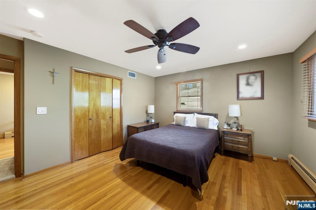 24 Maple Avenue Waldwick, NJ 07463 - Photo 27 of 45 a bedroom with a bed and window