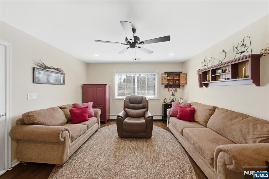 24 Maple Avenue Waldwick, NJ 07463 - Photo 4 of 45 a living room with furniture