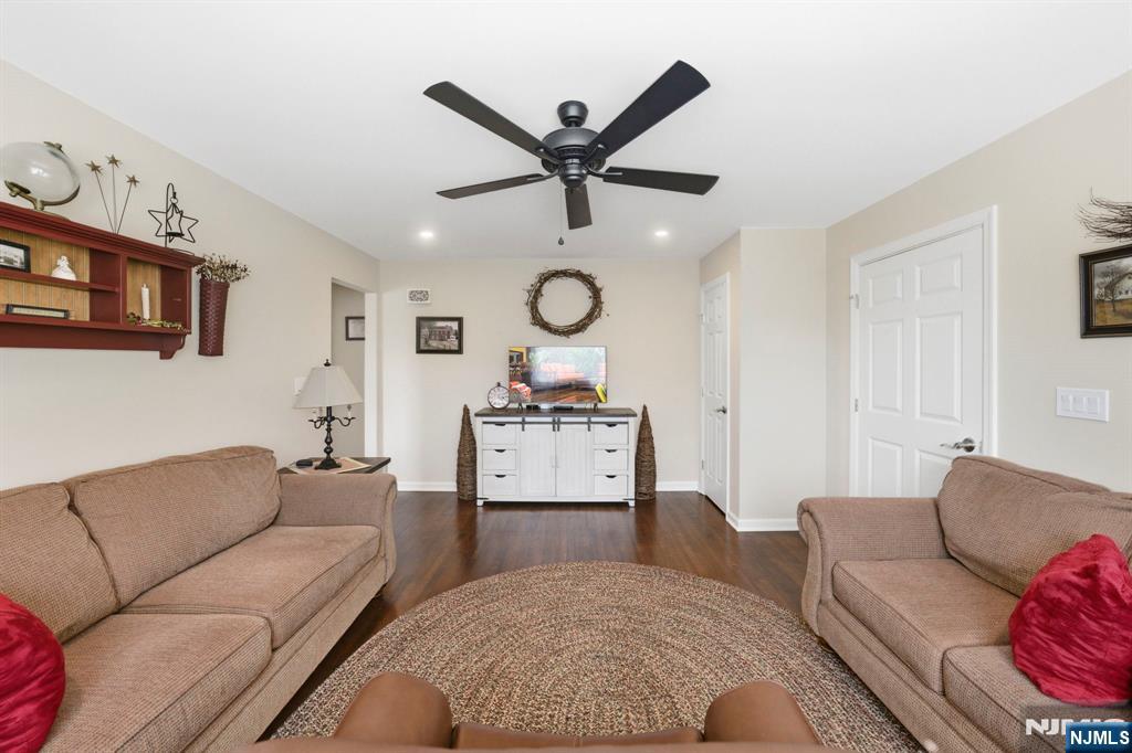 24 Maple Avenue Waldwick, NJ 07463 - Photo 5 of 45 a living room with furniture and a ceiling fan