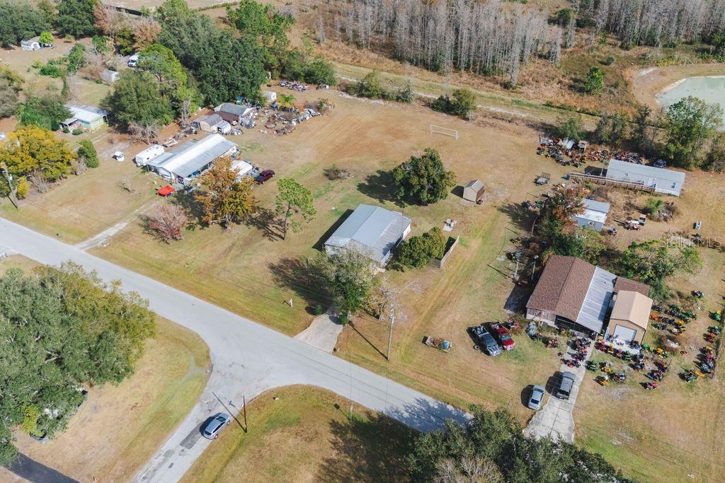 3648 Fox Ridge Boulevard Wesley Chapel, FL 33543 - Photo 4 of 30 an aerial view of a house with a yard basket ball court and outdoor seating