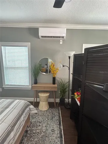 a bed room with a bed and a window