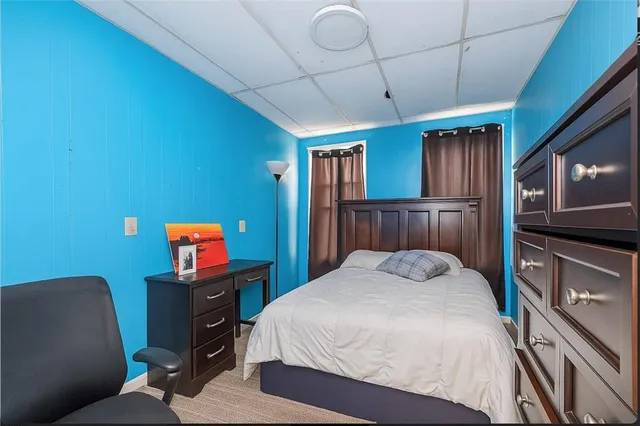 a view of entryway with furniture and rug