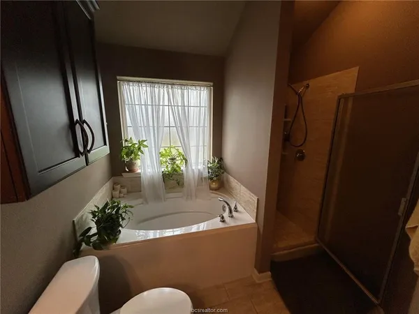 a view of a living room and a windows