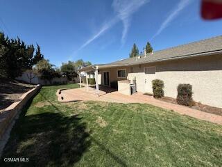 1457 Sycamore Drive Simi Valley, CA 93065 - Photo 3 of 8 a view of a backyard with sitting area