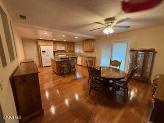 1457 Sycamore Drive Simi Valley, CA 93065 - Photo 7 of 8 a view of a dining room with furniture