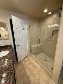 1457 Sycamore Drive Simi Valley, CA 93065 - Photo 8 of 8 a bathroom with a sink a toilet a mirror and shower