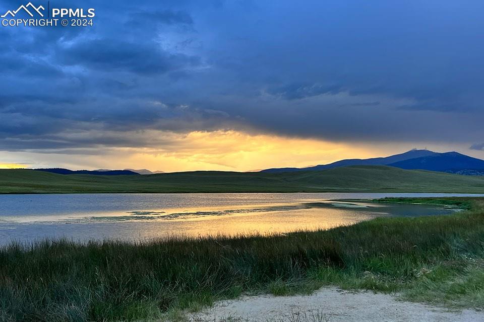 21103 Elkhorn Road Como, CO 80432 - Photo 3 of 11 a view of lake with mountain