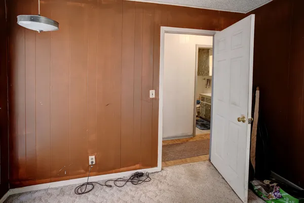 wooden floor and chair in a room