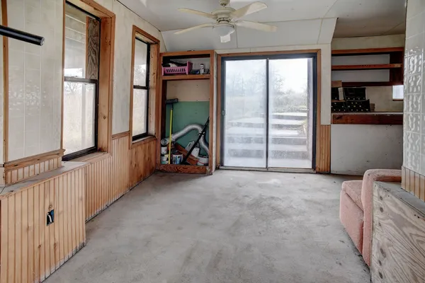an empty room with windows