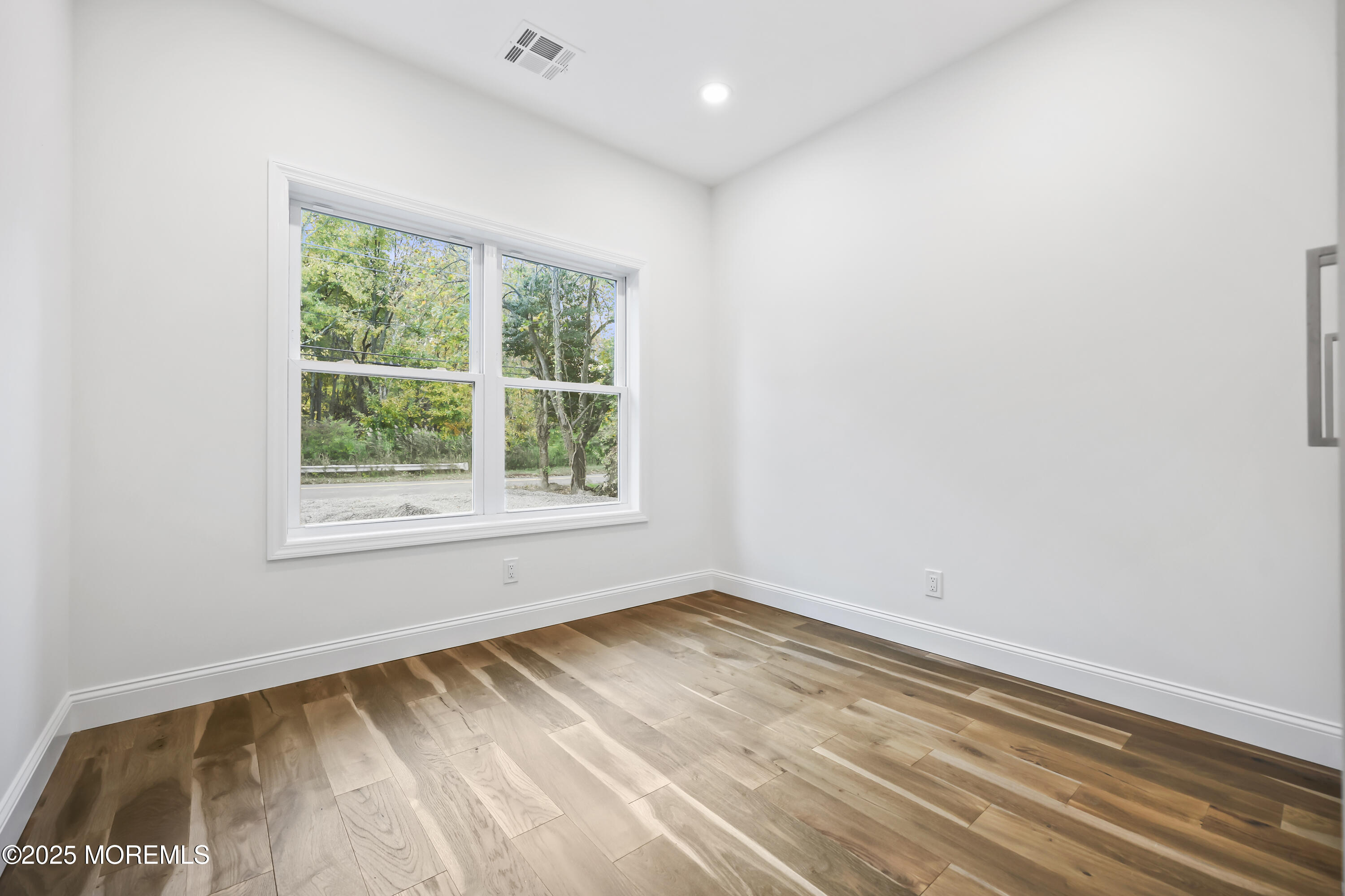 188 Texas Road Morganville, NJ 07751 - Photo 14 of 21 an empty room with a window