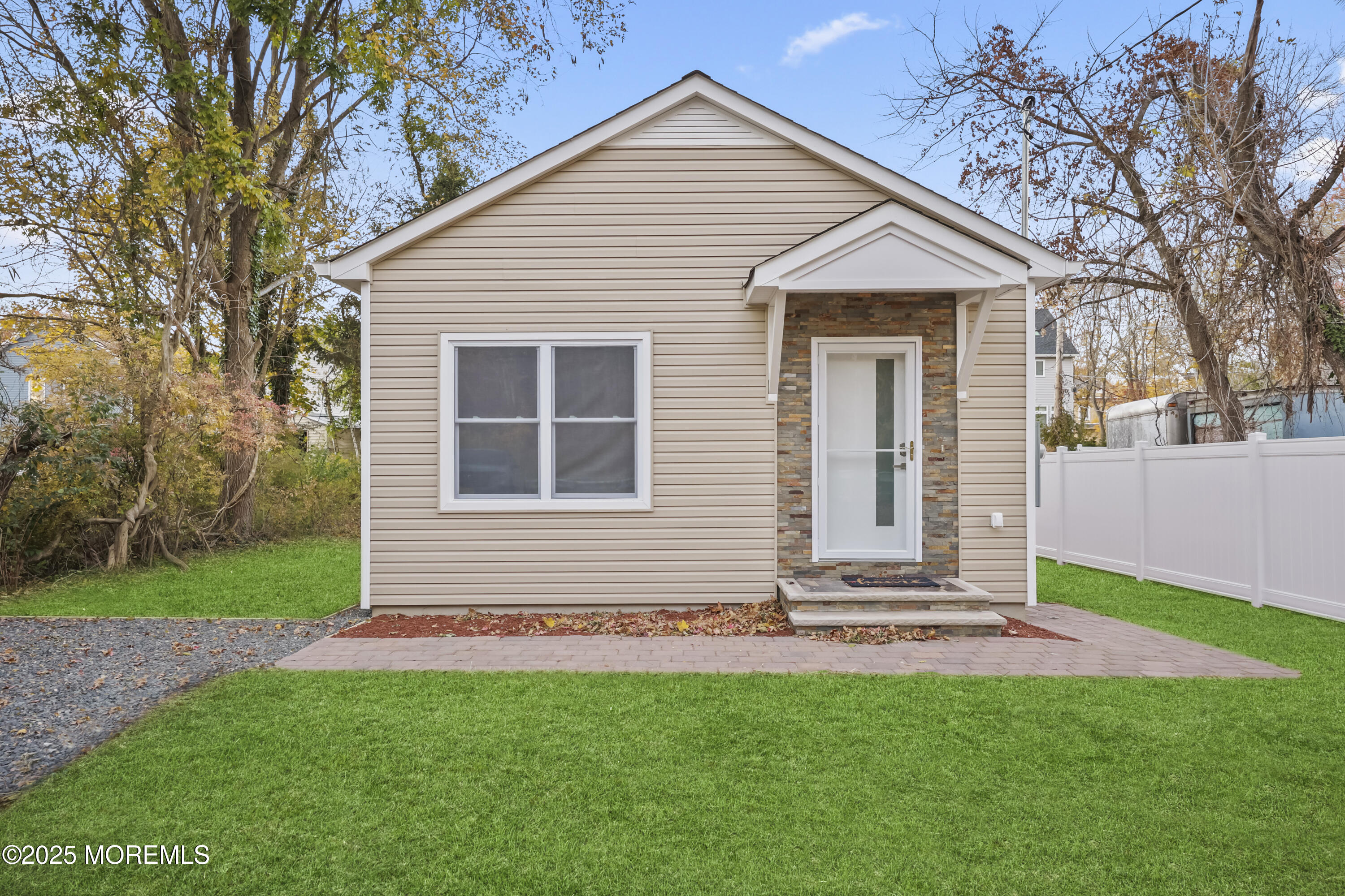 188 Texas Road Morganville, NJ 07751 - Photo 20 of 21 a front view of a house with a yard