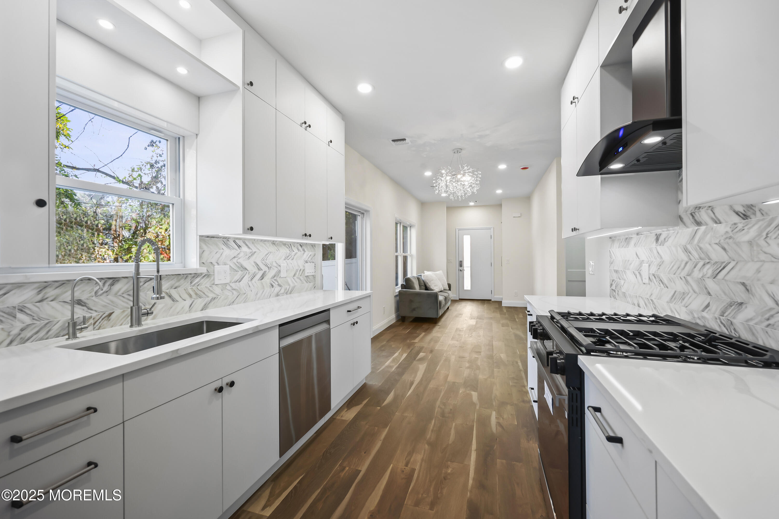 188 Texas Road Morganville, NJ 07751 - Photo 8 of 21 a kitchen with sink stove and refrigerator