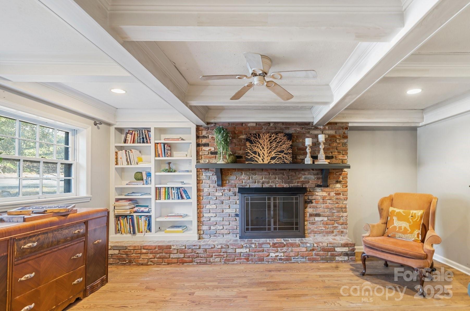 203 Davis Mountain Road Laurel Park, NC 28739 - Photo 17 of 37 a living room with furniture and a fireplace