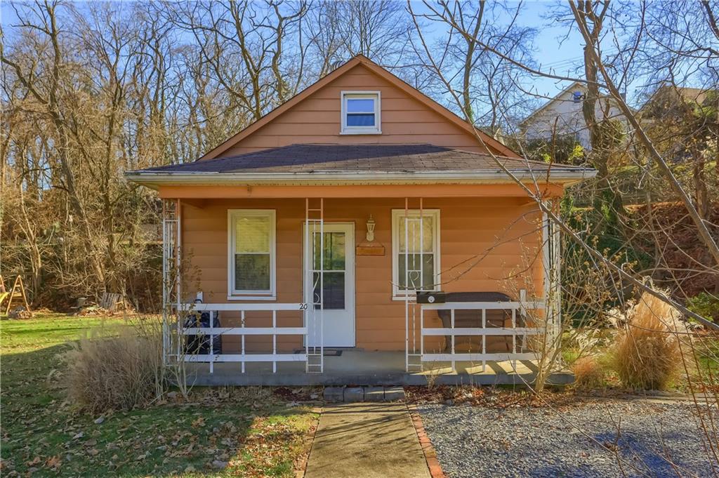 20 Deweyville Road McKees Rocks, PA 15136 - Photo 2 of 25 a front view of a house with garden