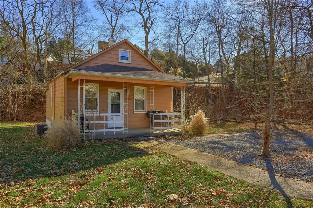20 Deweyville Road McKees Rocks, PA 15136 - Photo 3 of 25 a front view of a house with garden