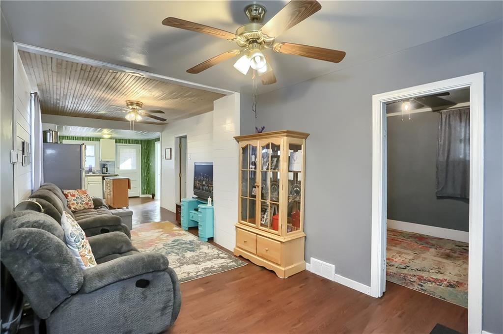 20 Deweyville Road McKees Rocks, PA 15136 - Photo 9 of 25 a living room with furniture and a ceiling fan