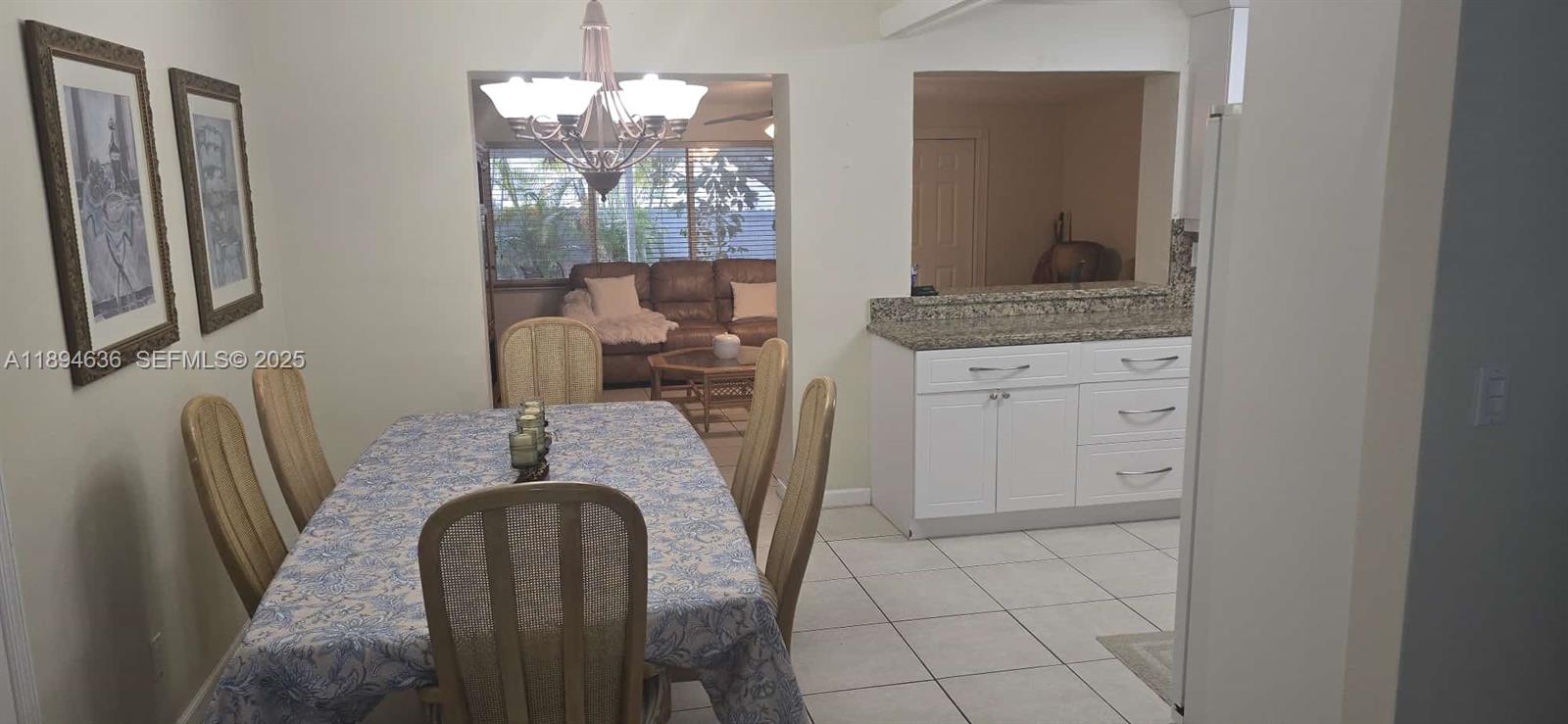 7160 West 10th Avenue Hialeah, FL 33014 - Photo 11 of 45 a dining room with furniture and window