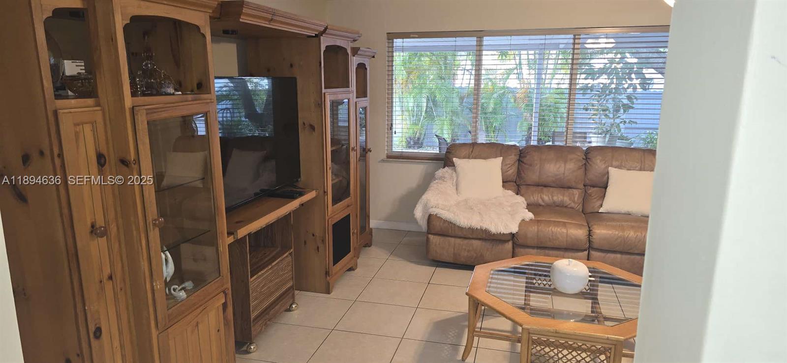 7160 West 10th Avenue Hialeah, FL 33014 - Photo 20 of 45 a living room with furniture