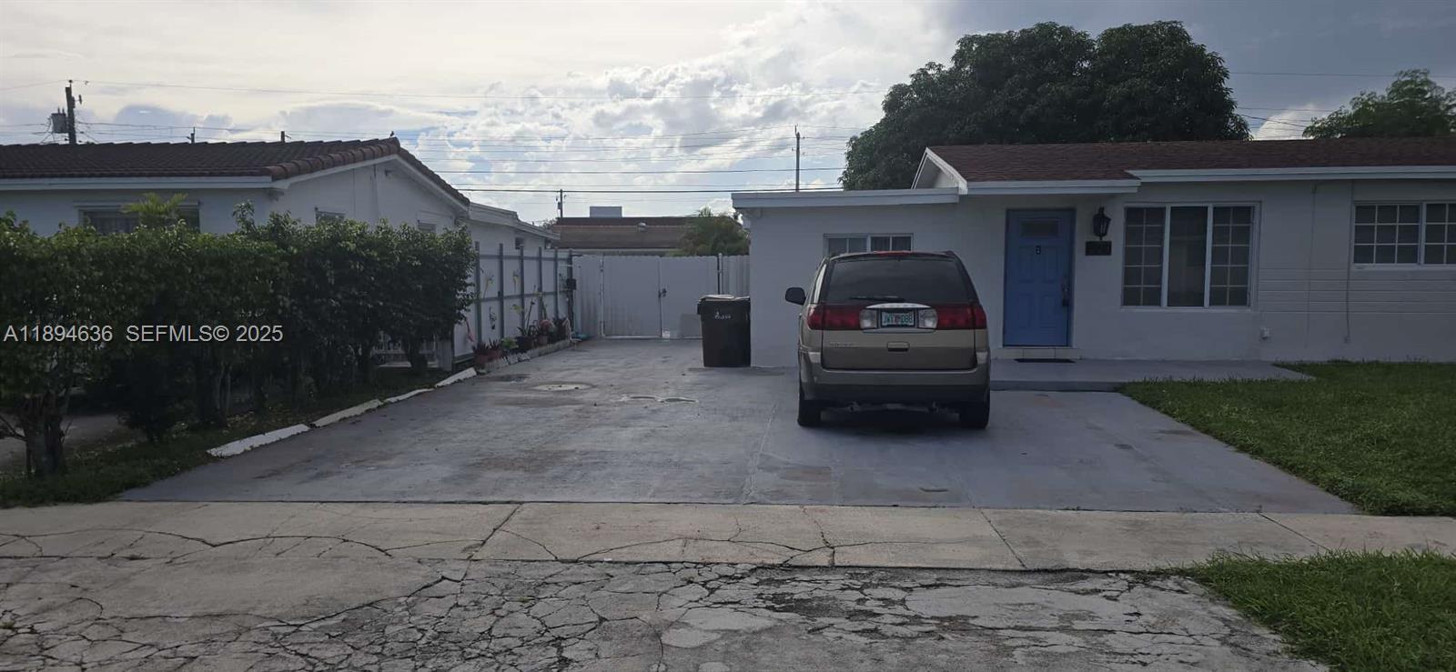 7160 West 10th Avenue Hialeah, FL 33014 - Photo 4 of 45 a car parked in front of house