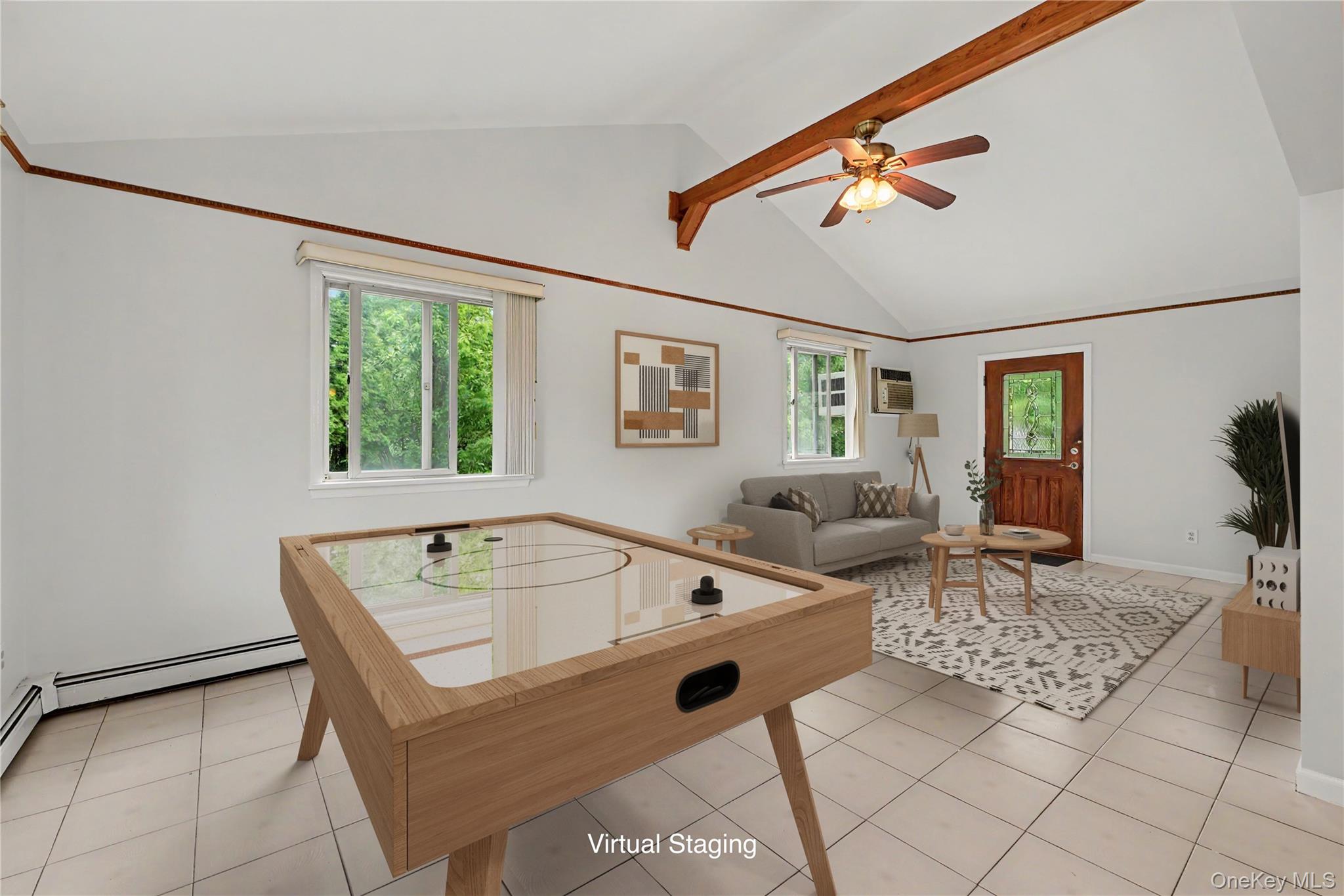 568 Manville Road, Unit UPPER R Pleasantville, NY 10570 - Photo 15 of 32 Virtually staged. Vaulted ceiling with exposed wood beams, ceiling fan, and light tile flooring. Door leads to private patio.
