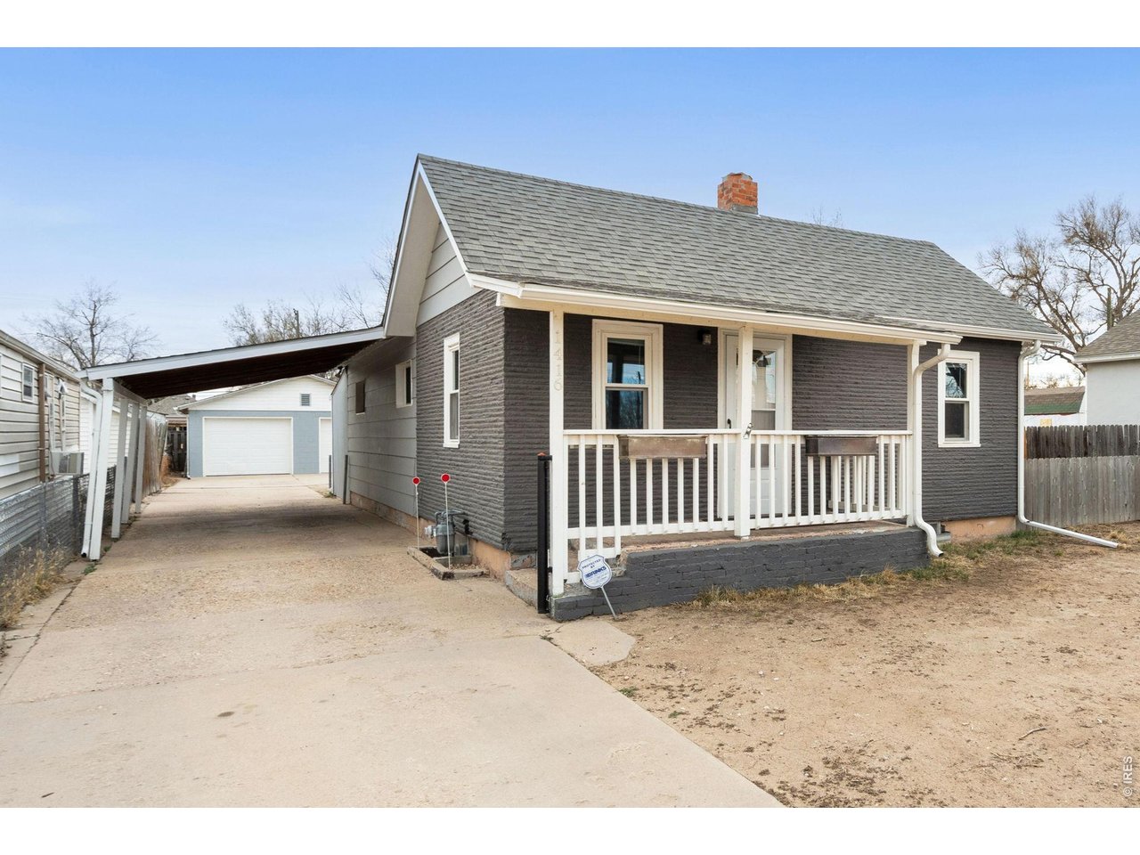 1416 6th Street Greeley, CO 80631 - Photo 1 of 50 a view of a house with a yard