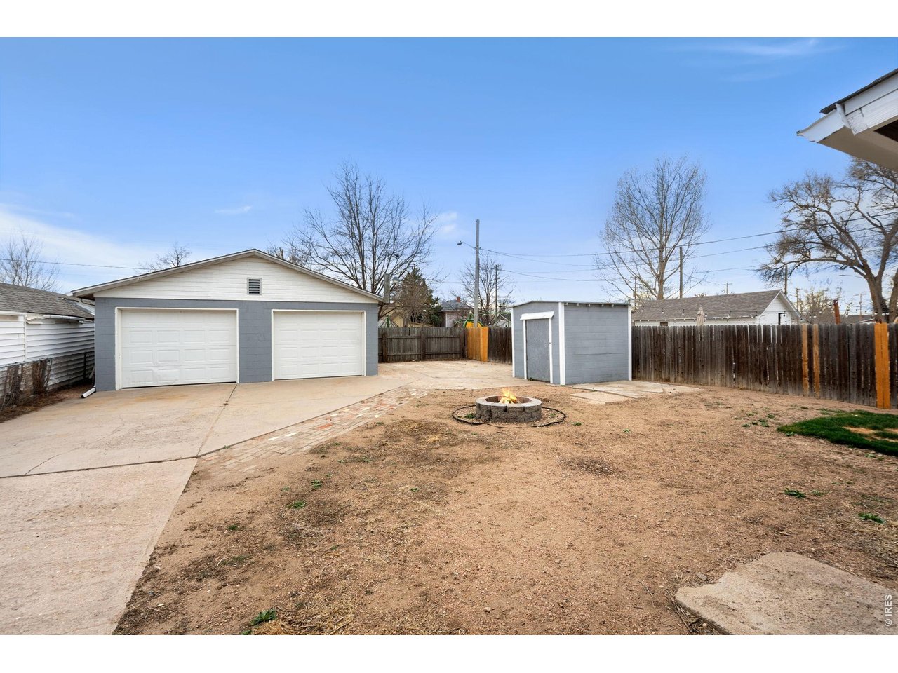 1416 6th Street Greeley, CO 80631 - Photo 32 of 50 a view of a house with a yard and garage
