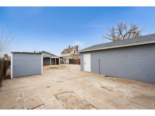 a view of a room with a flat screen tv