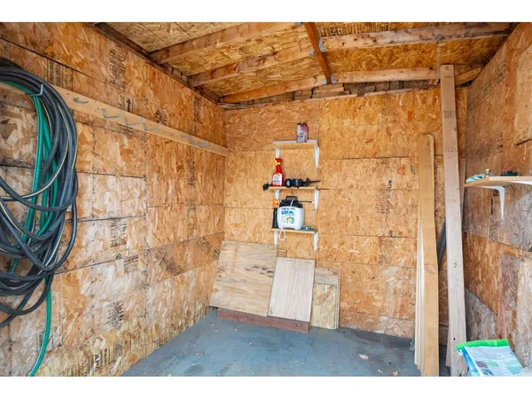 a bathroom with a shower and a mirror