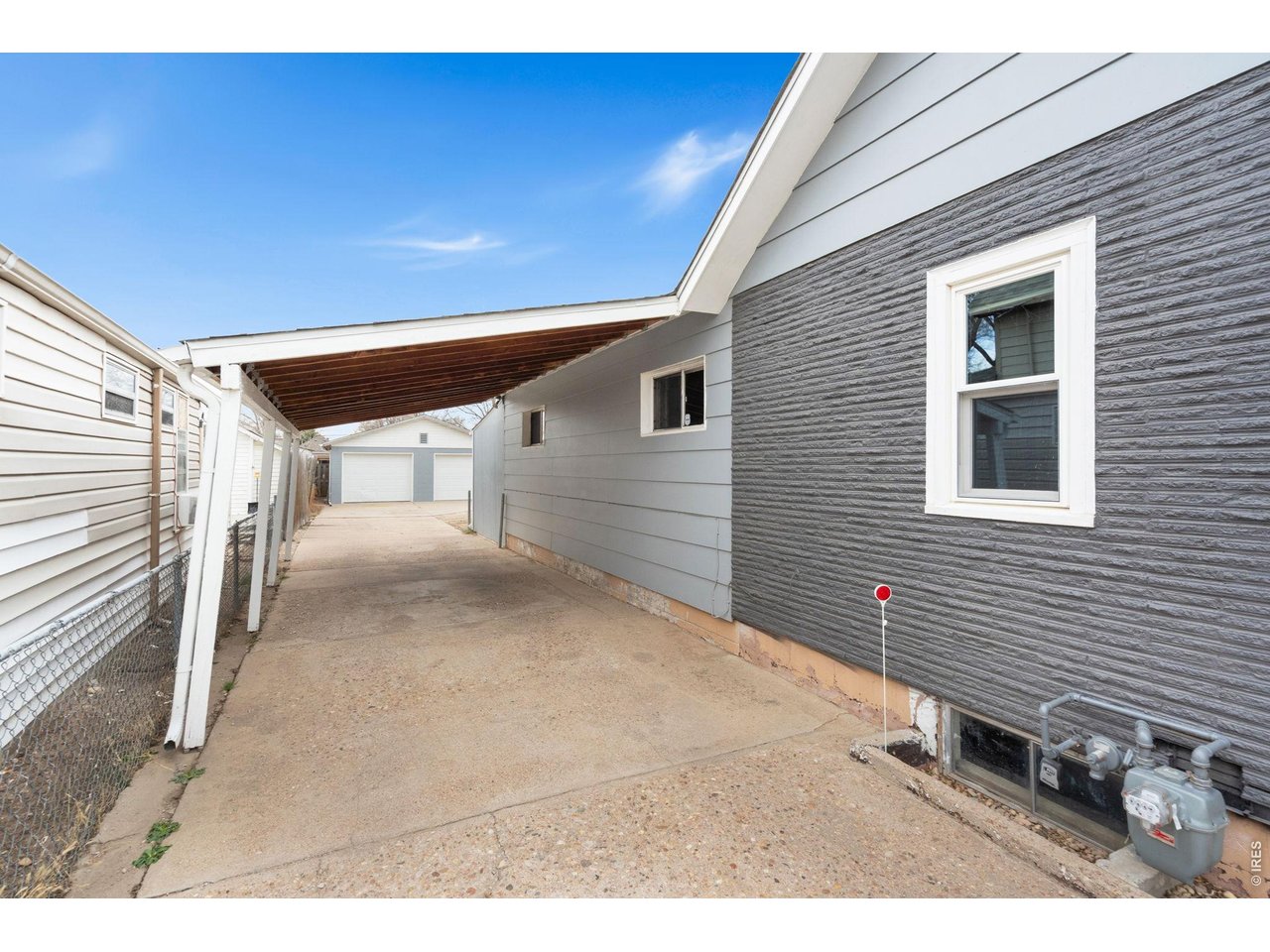 1416 6th Street Greeley, CO 80631 - Photo 40 of 50 a view of a house with a garage