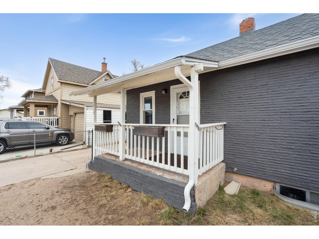 1416 6th Street Greeley, CO 80631 - Photo 42 of 50 a view of a house with a wooden deck