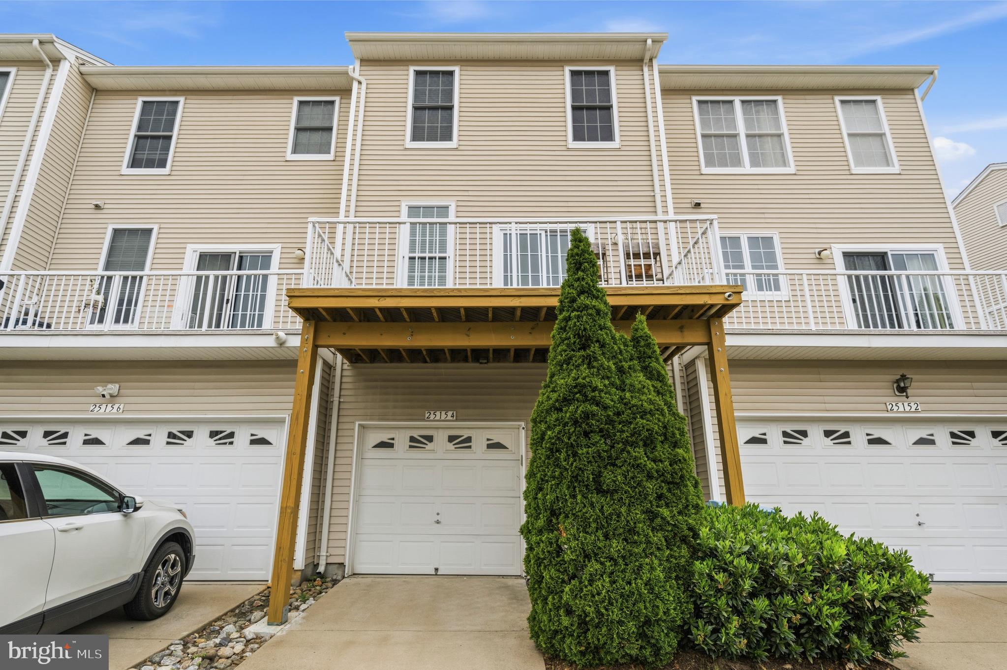 25154 Monteith Terrace Chantilly, VA 20152 - Photo 27 of 40 a front view of a house with a yard