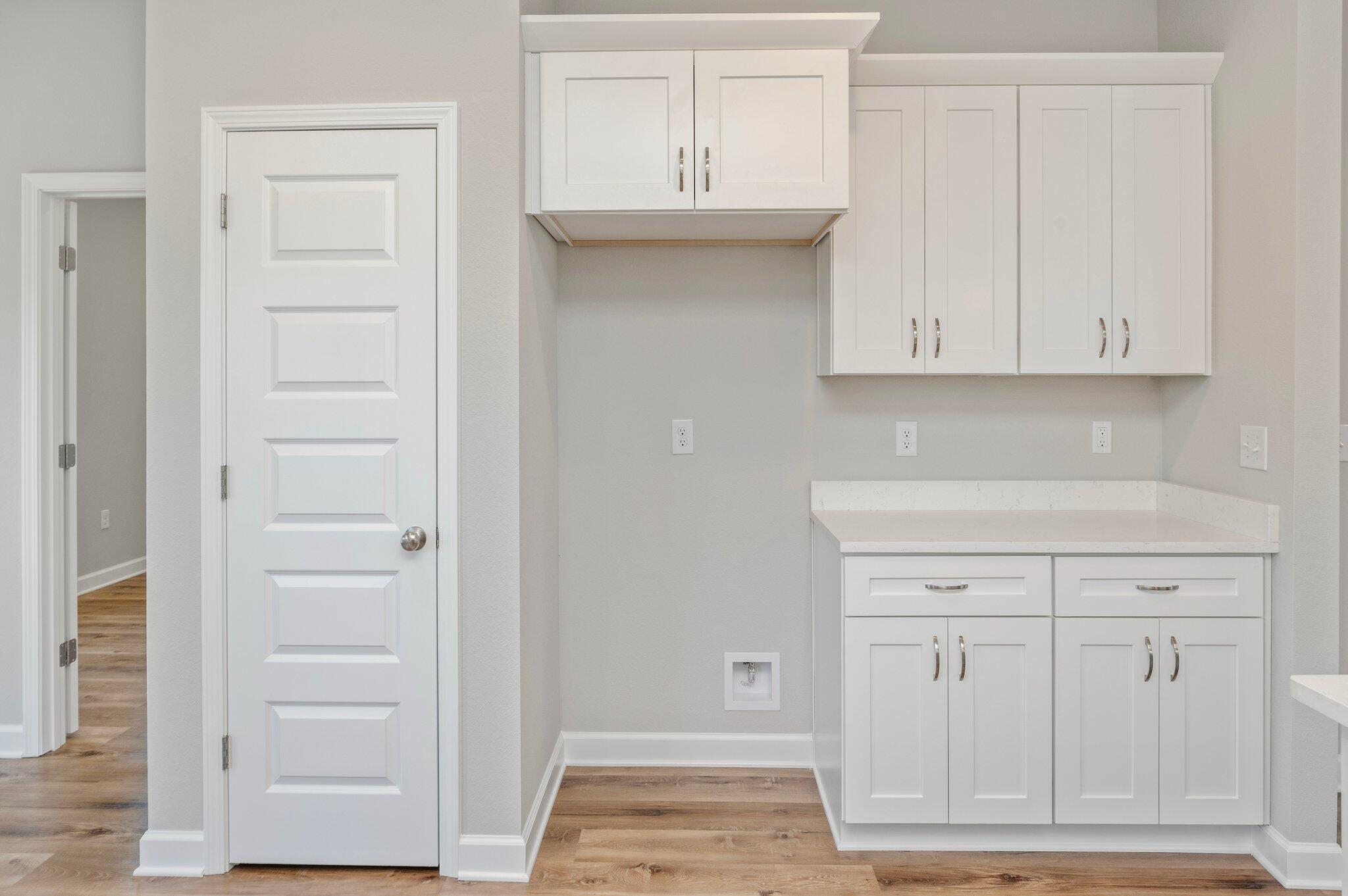 73 Lafayette Creek Freeport, FL 32439 - Photo 11 of 38 a view of kitchen with white cabinets