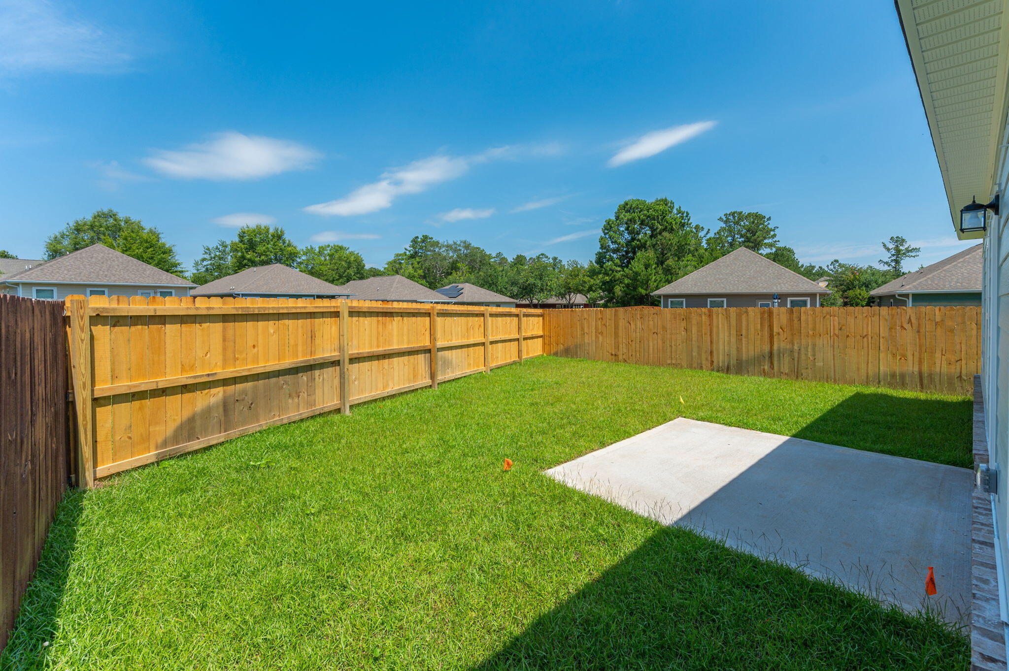 73 Lafayette Creek Freeport, FL 32439 - Photo 29 of 38 a view of yard with swimming pool and green space
